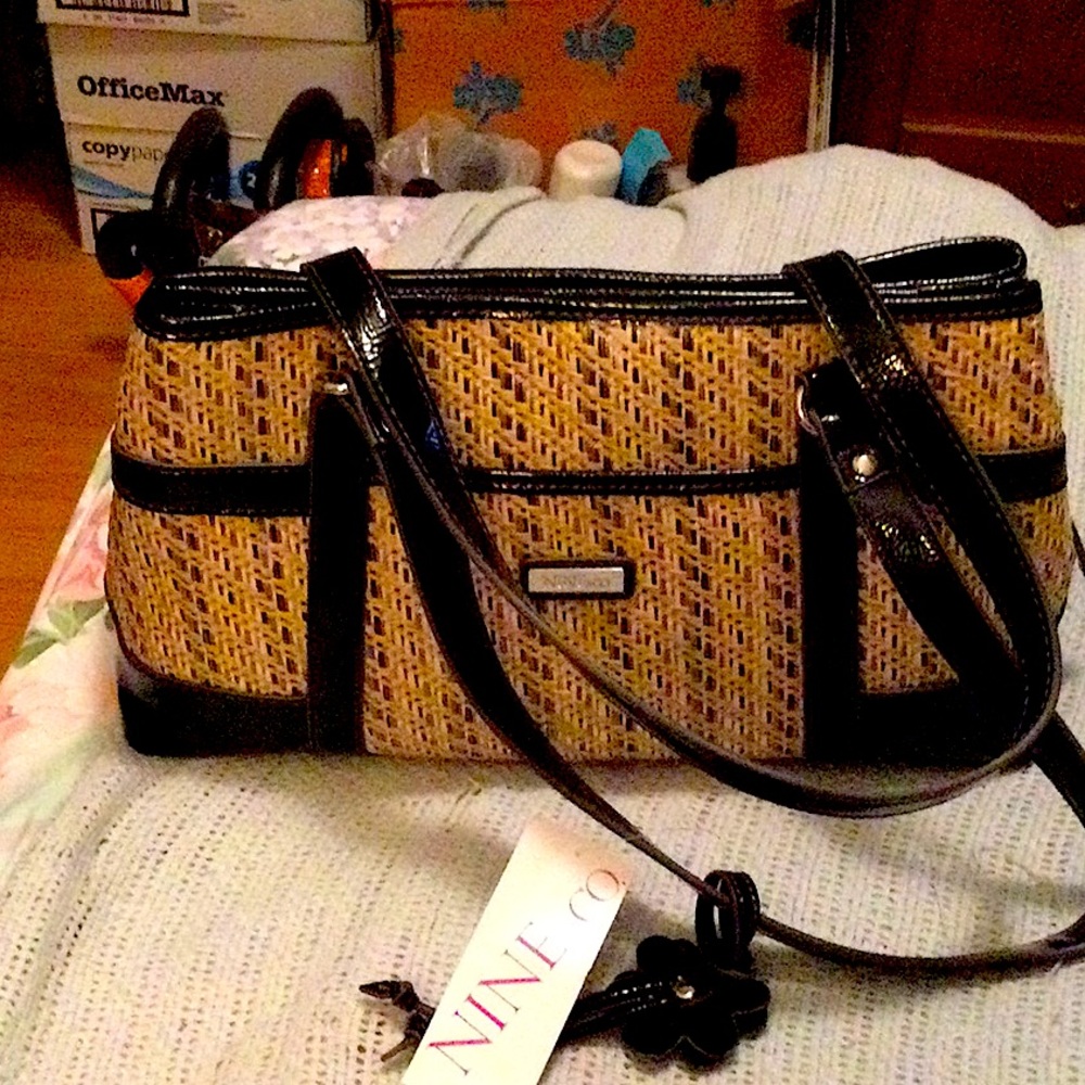 Nine & Co. handbag. Chocolate brown patent like accents-vinyl & straw motif.